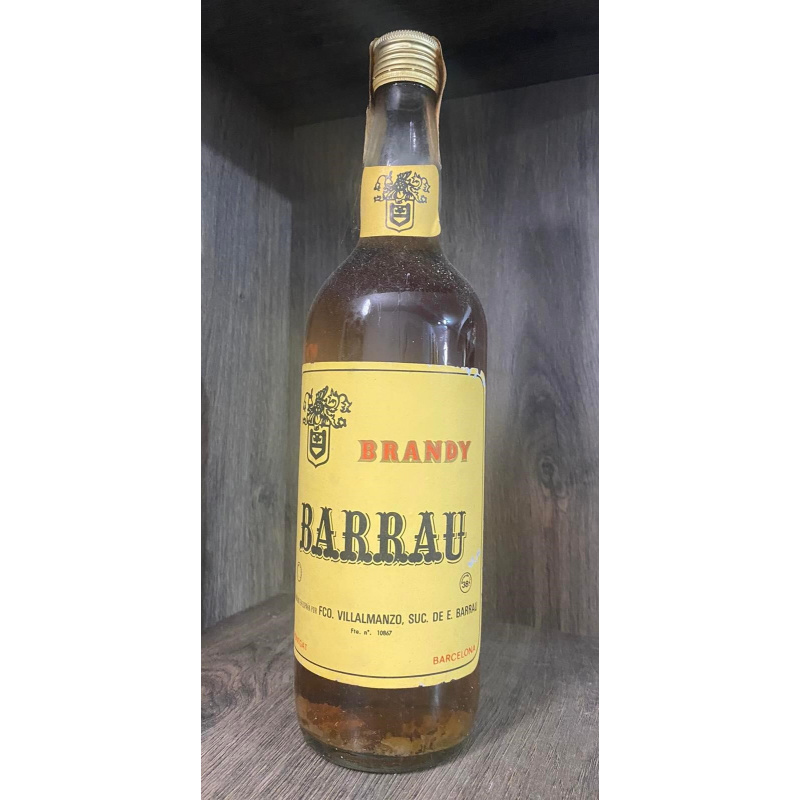 Три бутылки одним лотом . Хересный бренди "Barrau",Испания,1 литр , 1974 год.